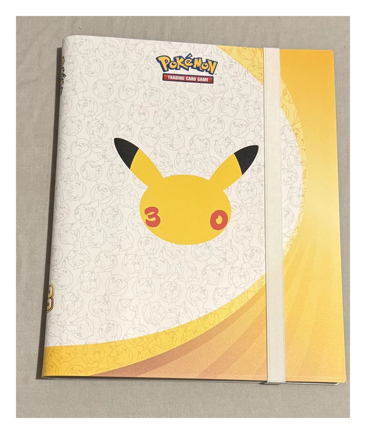 Pokemon 30th Celebration 9-pocket binder from the Binder Collection, Pikachu cover and gold spine