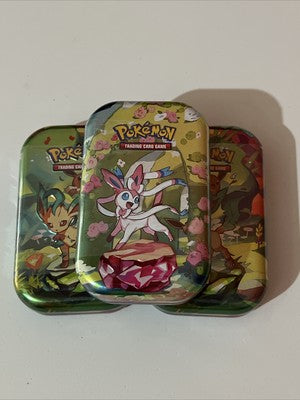 Three Pokemon Prismatic Evolutions mini tins delivered in perfect condition