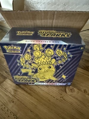 Pokemon Surging Sparks Elite Trainer Box fresh out of its shipping box